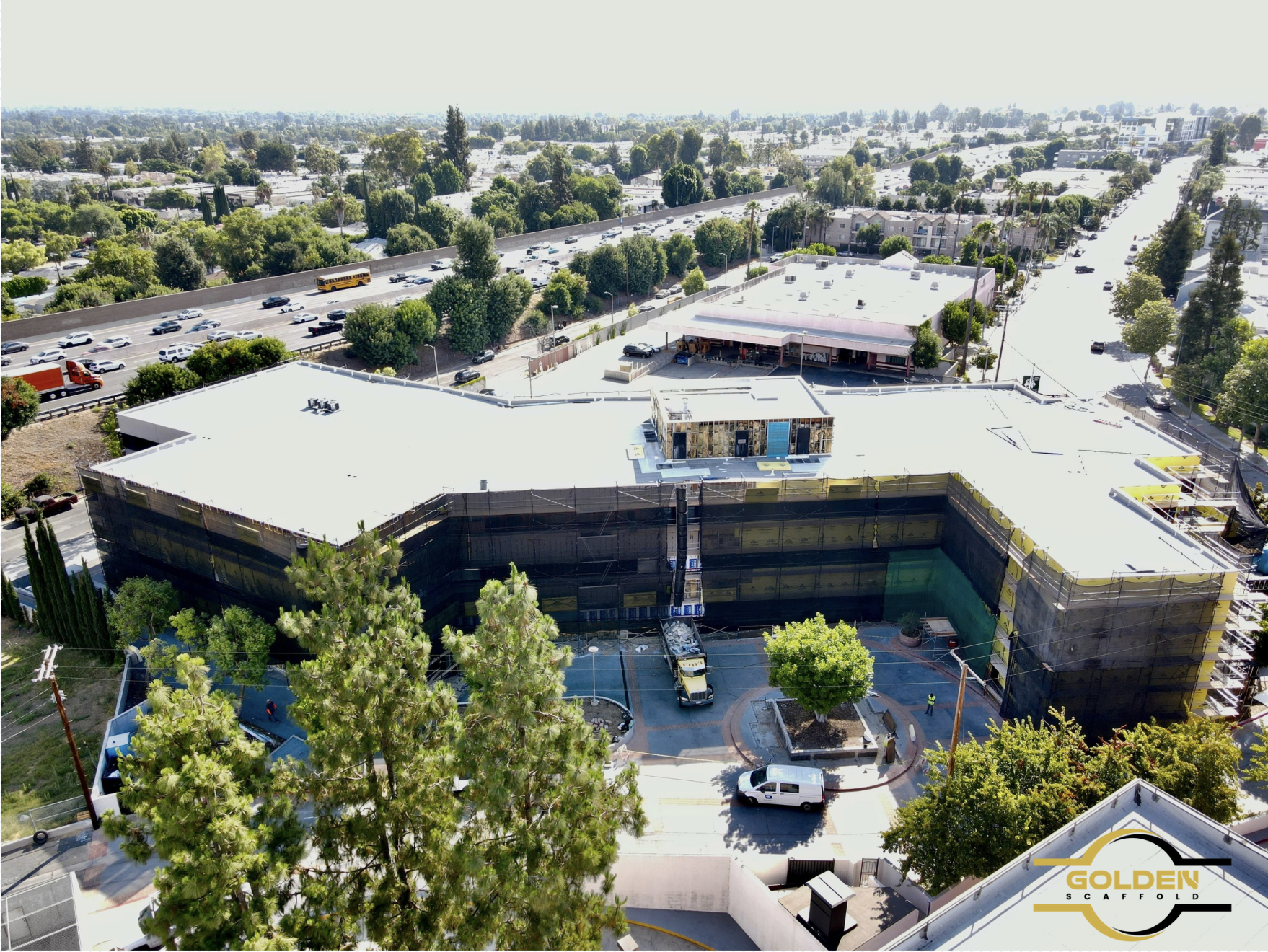 the tarzana san fernando valley office building during the renovation, using golden scaffold scaffolding rental solutions